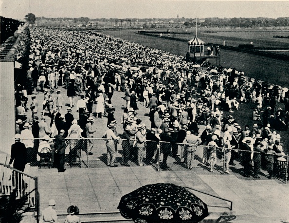 The Arlington Race Track, Chicago, c1930. Arlington International Racecourse was founded as Arlington Park by California businessman Harry D. Curly Brown. The track officially opened in 1927 to 20,000 spectators. From Flat Racing published by Seeley, Service & Co, Ltd., London, 1940. (Photo by Print Collector/Getty Images)